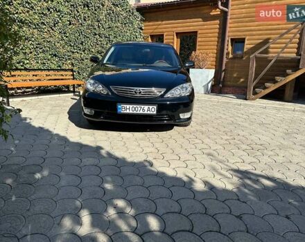 Черный Тойота Камри, объемом двигателя 2.36 л и пробегом 253 тыс. км за 6900 $, фото 7 на Automoto.ua
