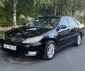 Черный Тойота Камри, объемом двигателя 2.4 л и пробегом 234 тыс. км за 6500 $, фото 1 на Automoto.ua