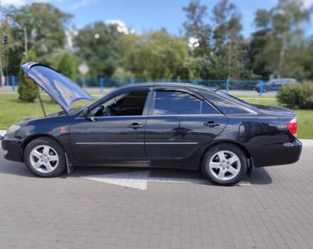 Черный Тойота Камри, объемом двигателя 2.4 л и пробегом 310 тыс. км за 6000 $, фото 3 на Automoto.ua