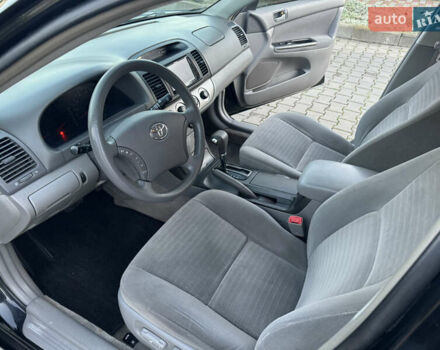 Черный Тойота Камри, объемом двигателя 2.36 л и пробегом 98 тыс. км за 8700 $, фото 41 на Automoto.ua