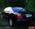 Чорний Тойота Камрі, об'ємом двигуна 2.4 л та пробігом 287 тис. км за 5300 $, фото 2 на Automoto.ua