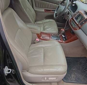 Чорний Тойота Камрі, об'ємом двигуна 2.4 л та пробігом 300 тис. км за 5500 $, фото 14 на Automoto.ua