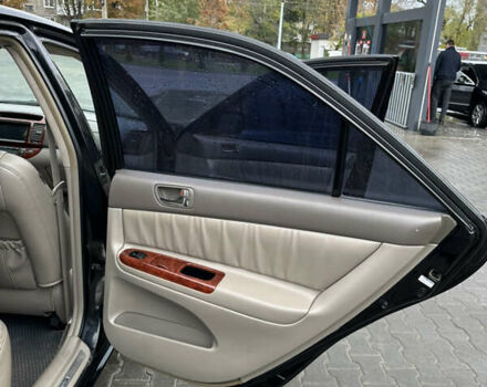 Чорний Тойота Камрі, об'ємом двигуна 2.4 л та пробігом 292 тис. км за 5350 $, фото 13 на Automoto.ua