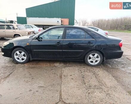 Черный Тойота Камри, объемом двигателя 3 л и пробегом 210 тыс. км за 7200 $, фото 6 на Automoto.ua