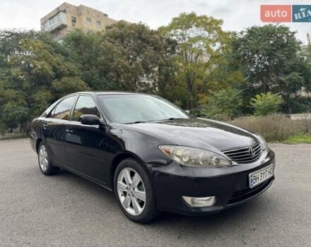 Чорний Тойота Камрі, об'ємом двигуна 2.36 л та пробігом 180 тис. км за 6000 $, фото 1 на Automoto.ua