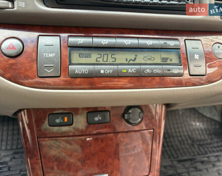 Черный Тойота Камри, объемом двигателя 2.4 л и пробегом 326 тыс. км за 6300 $, фото 20 на Automoto.ua