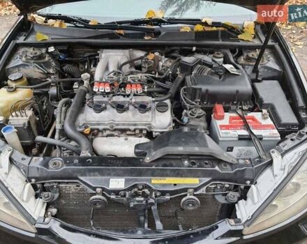 Чорний Тойота Камрі, об'ємом двигуна 3 л та пробігом 218 тис. км за 6400 $, фото 13 на Automoto.ua