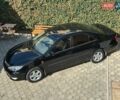Черный Тойота Камри, объемом двигателя 2.36 л и пробегом 253 тыс. км за 6900 $, фото 1 на Automoto.ua