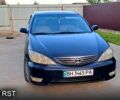 Черный Тойота Камри, объемом двигателя 3 л и пробегом 200 тыс. км за 6300 $, фото 1 на Automoto.ua