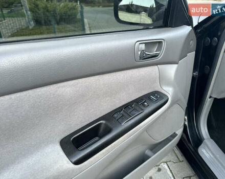 Черный Тойота Камри, объемом двигателя 2.36 л и пробегом 98 тыс. км за 8700 $, фото 67 на Automoto.ua