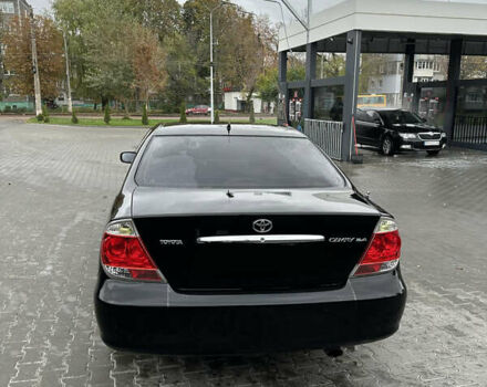 Чорний Тойота Камрі, об'ємом двигуна 2.4 л та пробігом 292 тис. км за 5350 $, фото 5 на Automoto.ua