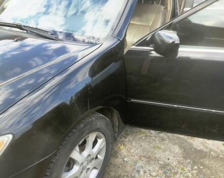 Чорний Тойота Камрі, об'ємом двигуна 3 л та пробігом 208 тис. км за 6700 $, фото 27 на Automoto.ua