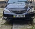 Черный Тойота Камри, объемом двигателя 2.4 л и пробегом 305 тыс. км за 5000 $, фото 1 на Automoto.ua