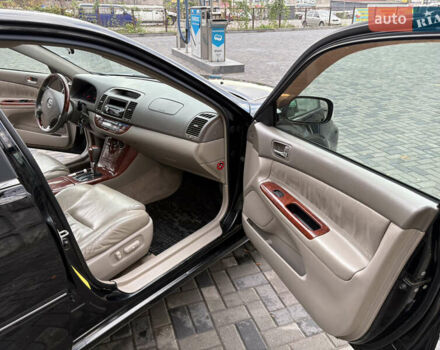 Черный Тойота Камри, объемом двигателя 2.4 л и пробегом 326 тыс. км за 6300 $, фото 14 на Automoto.ua