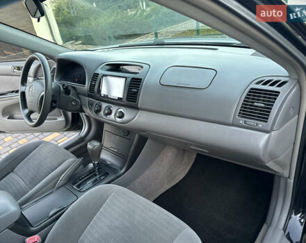 Черный Тойота Камри, объемом двигателя 2.36 л и пробегом 98 тыс. км за 8700 $, фото 80 на Automoto.ua