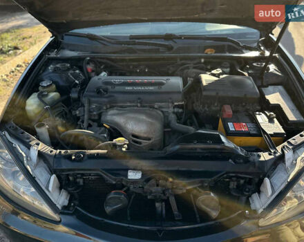 Черный Тойота Камри, объемом двигателя 2.4 л и пробегом 253 тыс. км за 6100 $, фото 3 на Automoto.ua