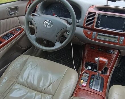 Чорний Тойота Камрі, об'ємом двигуна 0 л та пробігом 300 тис. км за 5100 $, фото 12 на Automoto.ua