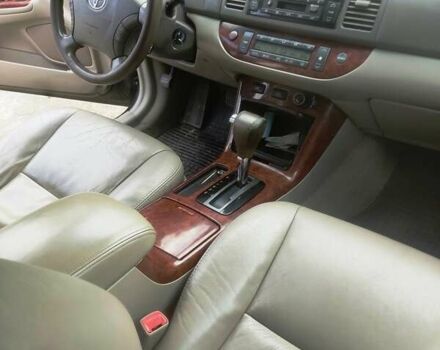 Чорний Тойота Камрі, об'ємом двигуна 3 л та пробігом 208 тис. км за 6700 $, фото 14 на Automoto.ua