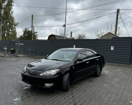 Чорний Тойота Камрі, об'ємом двигуна 2.4 л та пробігом 292 тис. км за 5350 $, фото 2 на Automoto.ua