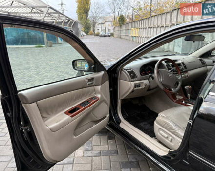 Черный Тойота Камри, объемом двигателя 2.4 л и пробегом 326 тыс. км за 6300 $, фото 9 на Automoto.ua