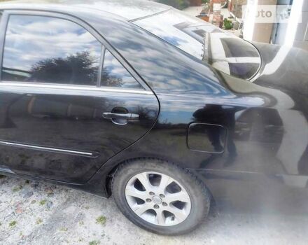 Чорний Тойота Камрі, об'ємом двигуна 3 л та пробігом 208 тис. км за 6700 $, фото 31 на Automoto.ua