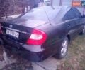 Черный Тойота Камри, объемом двигателя 2.4 л и пробегом 333 тыс. км за 4624 $, фото 1 на Automoto.ua