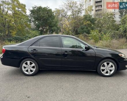 Чорний Тойота Камрі, об'ємом двигуна 2.36 л та пробігом 180 тис. км за 6000 $, фото 6 на Automoto.ua