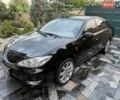 Чорний Тойота Камрі, об'ємом двигуна 2.4 л та пробігом 396 тис. км за 5000 $, фото 1 на Automoto.ua