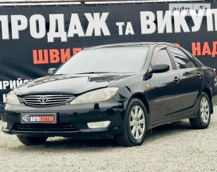 Чорний Тойота Камрі, об'ємом двигуна 3 л та пробігом 378 тис. км за 6600 $, фото 6 на Automoto.ua