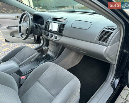 Черный Тойота Камри, объемом двигателя 2.36 л и пробегом 98 тыс. км за 8700 $, фото 71 на Automoto.ua