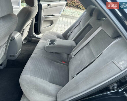 Черный Тойота Камри, объемом двигателя 2.36 л и пробегом 98 тыс. км за 8700 $, фото 61 на Automoto.ua