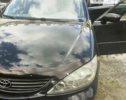 Чорний Тойота Камрі, об'ємом двигуна 3 л та пробігом 208 тис. км за 6700 $, фото 26 на Automoto.ua