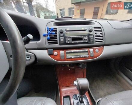 Чорний Тойота Камрі, об'ємом двигуна 3 л та пробігом 267 тис. км за 7500 $, фото 3 на Automoto.ua