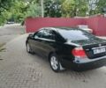 Черный Тойота Камри, объемом двигателя 2.4 л и пробегом 303 тыс. км за 5800 $, фото 3 на Automoto.ua