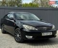 Черный Тойота Камри, объемом двигателя 2.36 л и пробегом 132 тыс. км за 8700 $, фото 1 на Automoto.ua