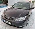 Черный Тойота Камри, объемом двигателя 2.4 л и пробегом 85 тыс. км за 10800 $, фото 1 на Automoto.ua
