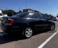 Черный Тойота Камри, объемом двигателя 2.4 л и пробегом 278 тыс. км за 5200 $, фото 2 на Automoto.ua