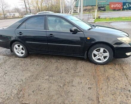 Черный Тойота Камри, объемом двигателя 3 л и пробегом 210 тыс. км за 7200 $, фото 5 на Automoto.ua