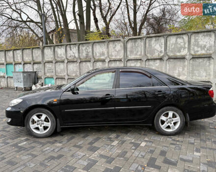 Черный Тойота Камри, объемом двигателя 2.4 л и пробегом 326 тыс. км за 6300 $, фото 2 на Automoto.ua