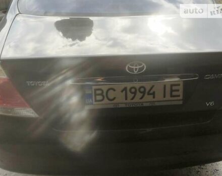 Чорний Тойота Камрі, об'ємом двигуна 3 л та пробігом 208 тис. км за 6700 $, фото 42 на Automoto.ua