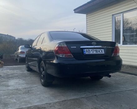 Черный Тойота Камри, объемом двигателя 2.4 л и пробегом 300 тыс. км за 7500 $, фото 3 на Automoto.ua