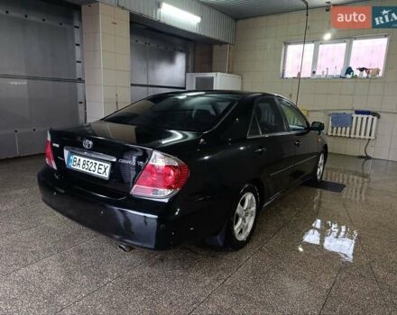 Черный Тойота Камри, объемом двигателя 3 л и пробегом 210 тыс. км за 7200 $, фото 2 на Automoto.ua