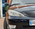 Черный Тойота Камри, объемом двигателя 2.36 л и пробегом 167 тыс. км за 7900 $, фото 1 на Automoto.ua