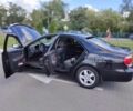 Черный Тойота Камри, объемом двигателя 2.4 л и пробегом 310 тыс. км за 6000 $, фото 1 на Automoto.ua