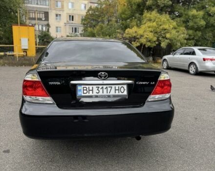 Черный Тойота Камри, объемом двигателя 2.4 л и пробегом 180 тыс. км за 6000 $, фото 6 на Automoto.ua