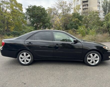 Черный Тойота Камри, объемом двигателя 2.4 л и пробегом 180 тыс. км за 6000 $, фото 5 на Automoto.ua