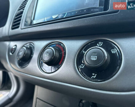 Черный Тойота Камри, объемом двигателя 2.36 л и пробегом 98 тыс. км за 8700 $, фото 79 на Automoto.ua