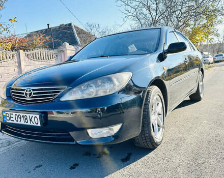 Черный Тойота Камри, объемом двигателя 2.4 л и пробегом 253 тыс. км за 6100 $, фото 2 на Automoto.ua