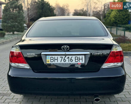 Черный Тойота Камри, объемом двигателя 2.36 л и пробегом 98 тыс. км за 8700 $, фото 20 на Automoto.ua