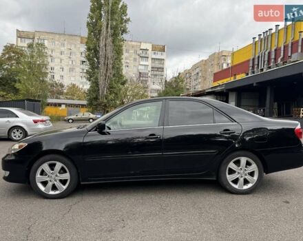 Чорний Тойота Камрі, об'ємом двигуна 2.36 л та пробігом 180 тис. км за 6000 $, фото 7 на Automoto.ua